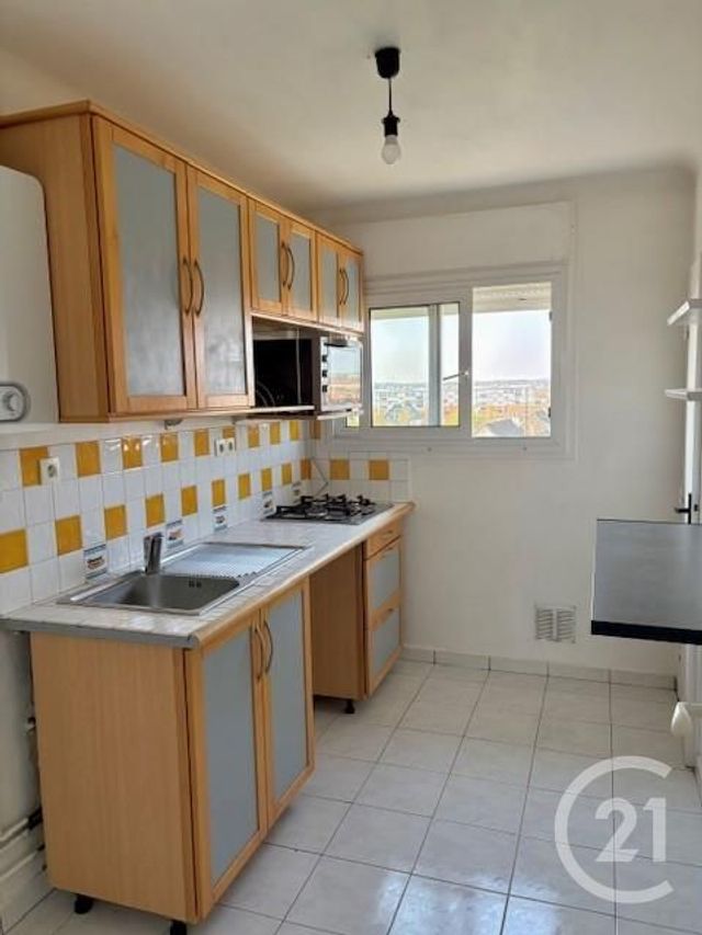 Appartement à louer - 3 pièces - 59.42 m2 - SARTROUVILLE - 78 - ILE-DE-FRANCE - Century 21 G.T.I.